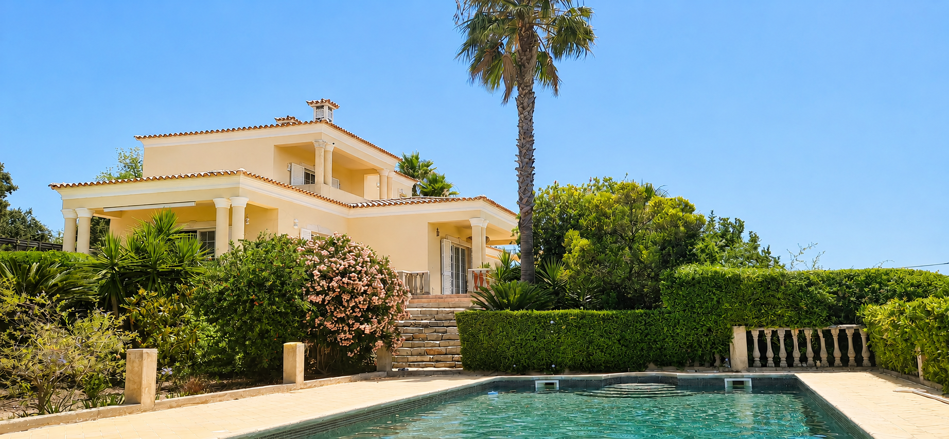 Casa Amani villa and heated pool in the Algarve at golden hour