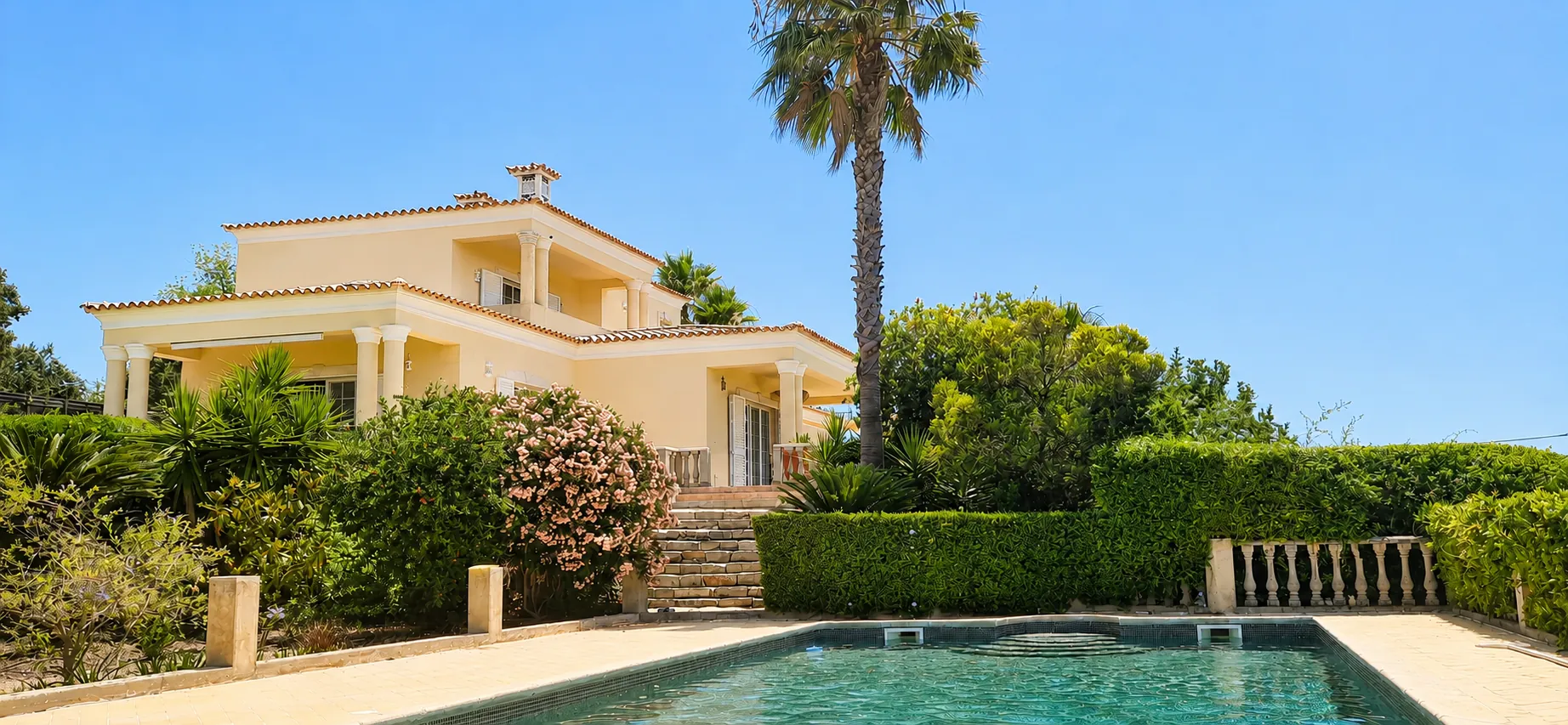 Casa Amani villa and heated pool in the Algarve at golden hour